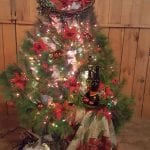 Christmas tree decorated with poinsettias