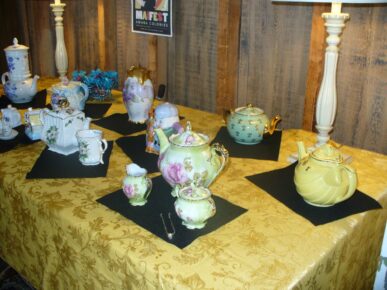 Several tea sets of various types and colors