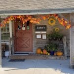 Front of Zuber's Homestead Hotel decorated in fall decor